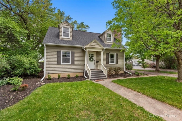 1315 W Galena Blvd, Aurora, IL 60506 - new england style home featuring a front lawn and a shingled roof