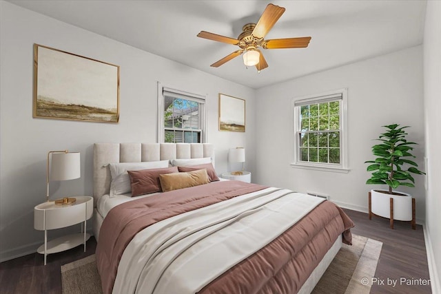 1315 W Galena Blvd, Aurora, IL 60506 - bedroom featuring dark wood finished floors, baseboards, and a ceiling fan