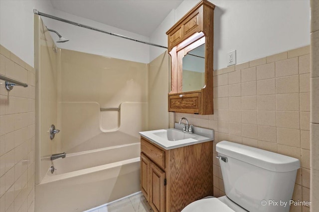 1315 W Galena Blvd, Aurora, IL 60506 - full bath with tile walls, toilet, shower / bathtub combination, and vanity