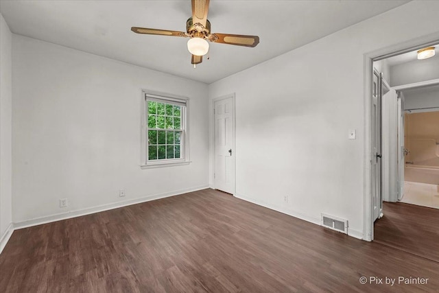 1315 W Galena Blvd, Aurora, IL 60506 - spare room with wood finished floors, ceiling fan, and baseboards