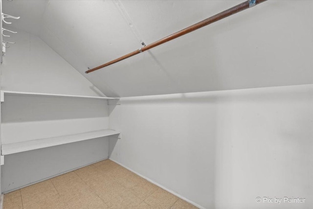 1315 W Galena Blvd, Aurora, IL 60506 - walk in closet featuring lofted ceiling and tile patterned floors