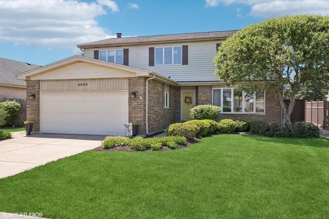 2950 Becket Ave, Westchester, IL 60154 - view of front of property with a garage, brick siding, and driveway