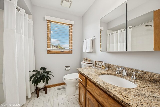 2950 Becket Ave, Westchester, IL 60154 - bathroom featuring toilet, baseboards, vanity, and curtained shower