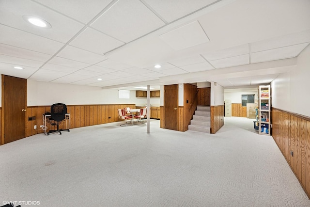 2950 Becket Ave, Westchester, IL 60154 - finished below grade area with a wainscoted wall, wood walls, stairs, and carpet