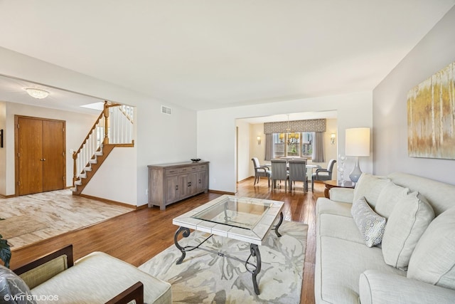 2950 Becket Ave, Westchester, IL 60154 - living area featuring wood finished floors, stairs, and baseboards