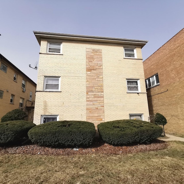 4444 N Central Ave Unit 2N, Chicago, IL 60630 - view of property exterior featuring brick siding