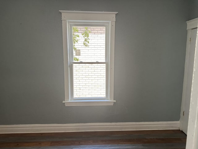 12010 S Michigan Ave, Chicago, IL 60628 - empty room with wood finished floors and baseboards
