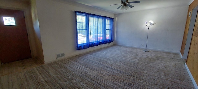704 S Neltnor Blvd, West Chicago, IL 60185 - spare room featuring plenty of natural light, ceiling fan, carpet, baseboards, and ornamental molding