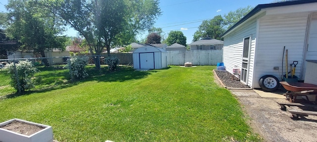 704 S Neltnor Blvd, West Chicago, IL 60185 - view of yard featuring a storage unit and an outdoor structure