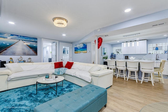 8027 S Green St, Chicago, IL 60620 - living area featuring light wood-type flooring and recessed lighting