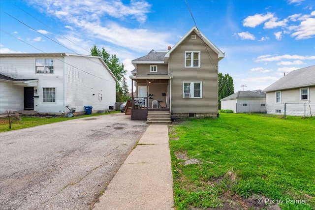 910 Market St, Dekalb, IL 60115 - traditional-style house with covered porch and driveway