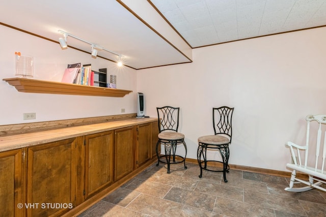 21W353 Drury Ln, Lombard, IL 60148 - sitting room featuring stone finish flooring, baseboards, and crown molding