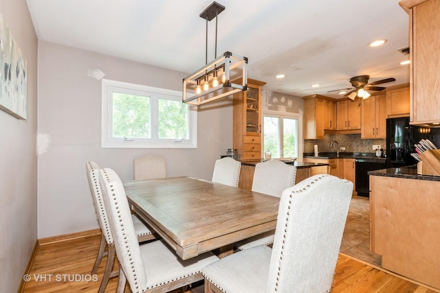21W353 Drury Ln, Lombard, IL 60148 - dining space featuring light wood-type flooring, a ceiling fan, recessed lighting, a chandelier, and baseboards