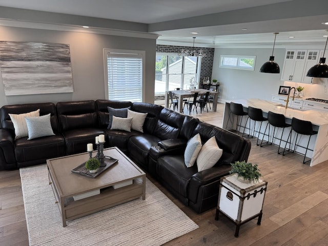 35 E Woodworth Pl, Roselle, IL 60172 - living room with light wood finished floors, crown molding, and recessed lighting