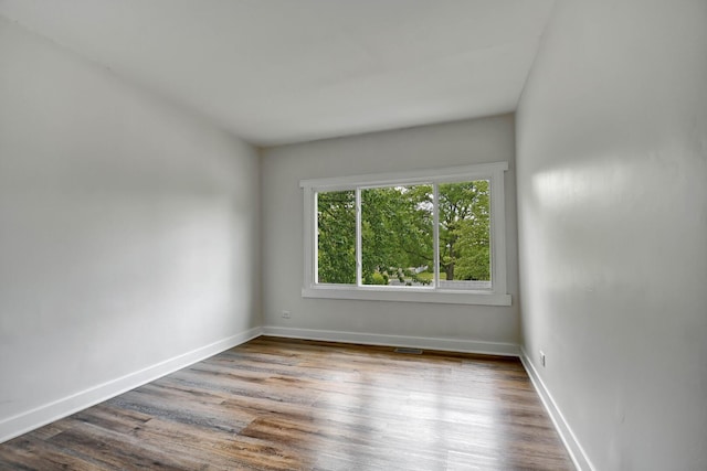 300 Redwing Dr, Bolingbrook, IL 60440 - unfurnished room with wood finished floors and baseboards