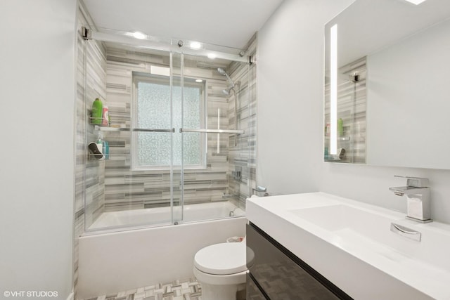 4253 Grove St, Skokie, IL 60076 - full bathroom featuring toilet, vanity, and combined bath / shower with glass door