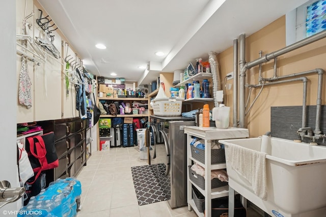 4253 Grove St, Skokie, IL 60076 - storage room featuring washer and dryer and a sink