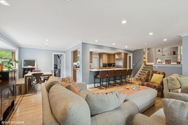 4253 Grove St, Skokie, IL 60076 - living room with light wood-type flooring, ornamental molding, stairs, and recessed lighting
