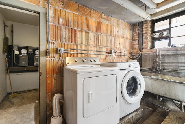 laundry area with washer and clothes dryer