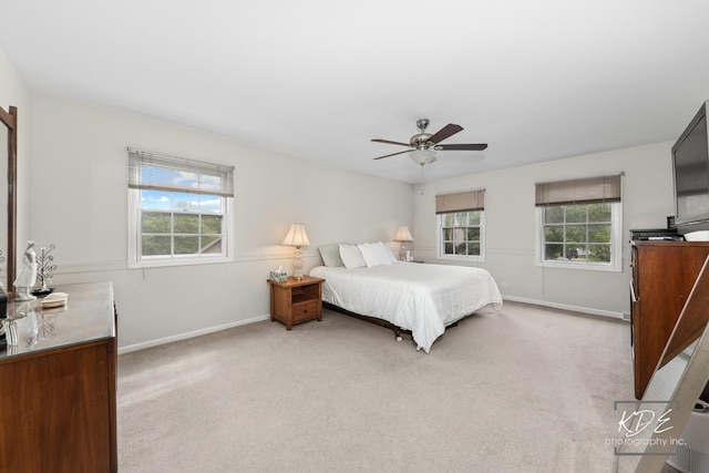 1309 Brunswick Ct, Naperville, IL 60540 - bedroom featuring multiple windows, light colored carpet, baseboards, and ceiling fan