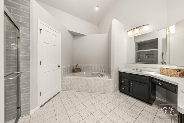 1309 Brunswick Ct, Naperville, IL 60540 - full bath with tile patterned floors, a bath, vanity, a shower stall, and vaulted ceiling