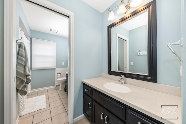 1309 Brunswick Ct, Naperville, IL 60540 - bathroom with vanity, tile patterned floors, toilet, and baseboards