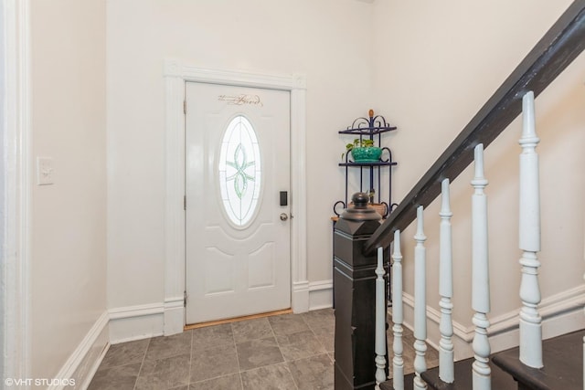 523 Spruce St, Aurora, IL 60506 - entryway featuring stairway and baseboards