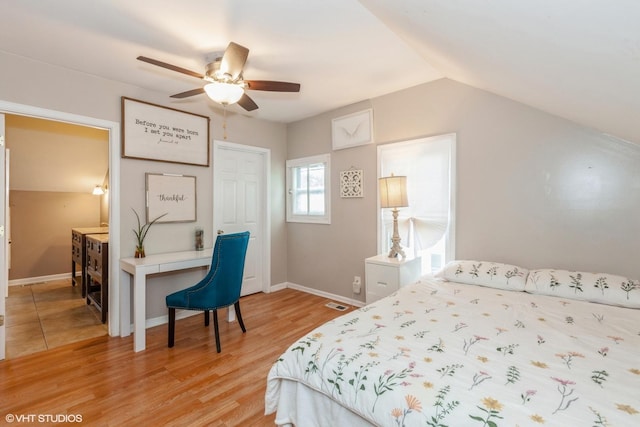 523 Spruce St, Aurora, IL 60506 - bedroom featuring light wood-style floors, baseboards, lofted ceiling, and a ceiling fan
