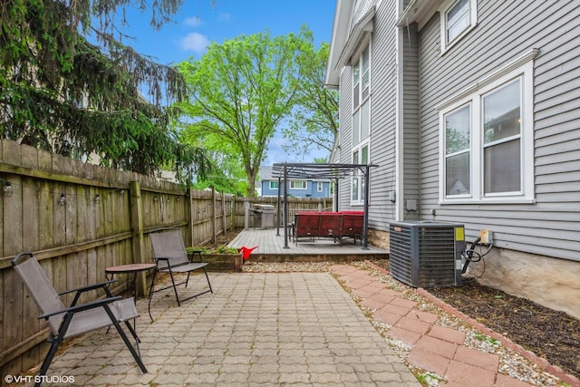 523 Spruce St, Aurora, IL 60506 - view of patio / terrace featuring a deck, central AC, and a fenced backyard
