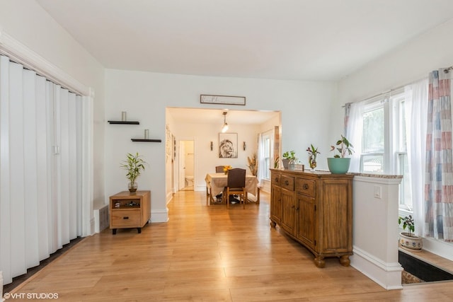 523 Spruce St, Aurora, IL 60506 - hallway featuring light wood-style flooring