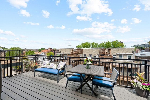 736 W Melrose St Unit 4W, Chicago, IL 60657 - wooden deck with a residential view