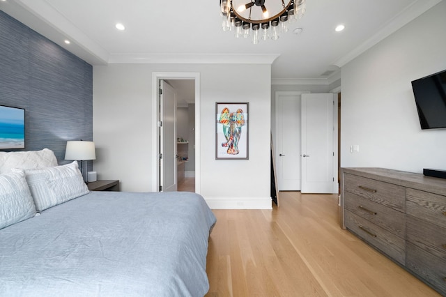 736 W Melrose St Unit 4W, Chicago, IL 60657 - bedroom featuring light wood-style floors, crown molding, baseboards, recessed lighting, and an accent wall