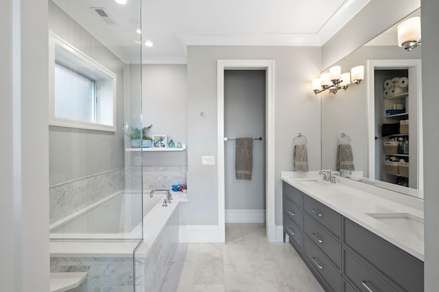 736 W Melrose St Unit 4W, Chicago, IL 60657 - bathroom with double vanity, a bath, marble look tile flooring, recessed lighting, and baseboards