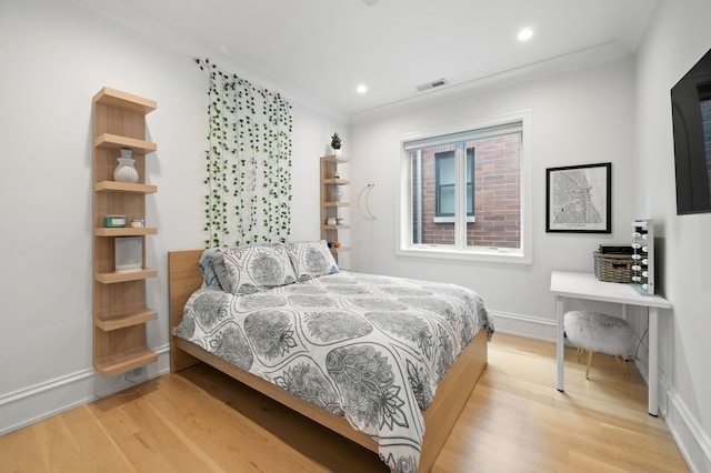 736 W Melrose St Unit 4W, Chicago, IL 60657 - bedroom with wood finished floors, baseboards, recessed lighting, and crown molding
