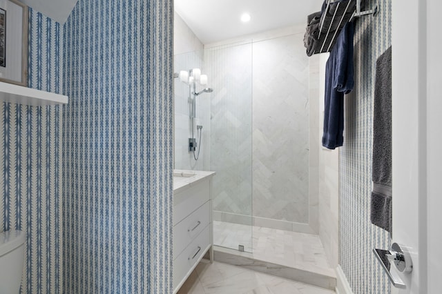 736 W Melrose St Unit 4W, Chicago, IL 60657 - bathroom with walk in shower, vanity, marble finish flooring, and toilet