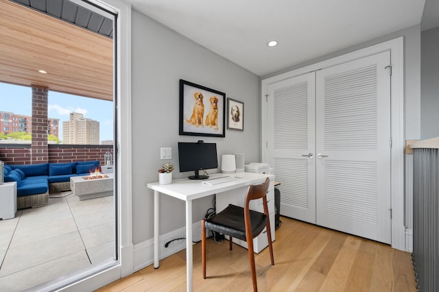 736 W Melrose St Unit 4W, Chicago, IL 60657 - office space with light wood-style flooring and recessed lighting