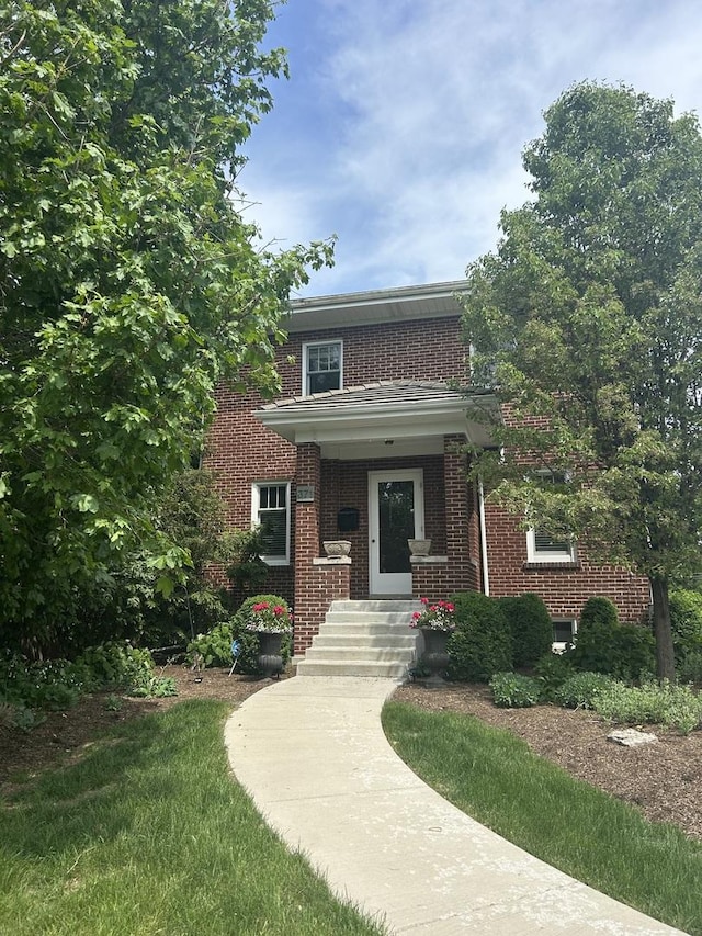 view of front of property with brick siding