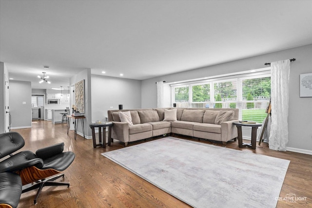 2255 University Dr, Naperville, IL 60565 - living room featuring wood finished floors, recessed lighting, baseboards, and a chandelier