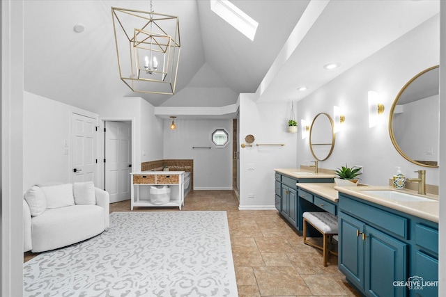 2255 University Dr, Naperville, IL 60565 - full bath with double vanity, a skylight, baseboards, a chandelier, and high vaulted ceiling