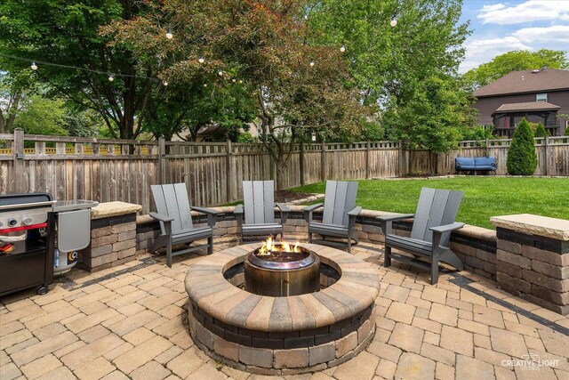 2255 University Dr, Naperville, IL 60565 - view of patio featuring an outdoor fire pit