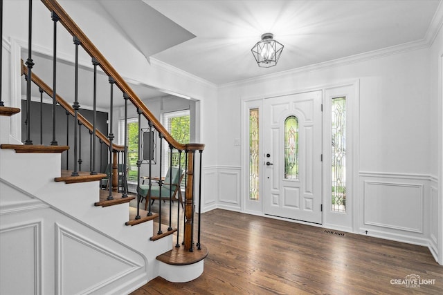 2255 University Dr, Naperville, IL 60565 - entryway featuring a decorative wall, wood finished floors, plenty of natural light, stairs, and ornamental molding
