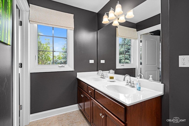 25700 Pastoral Dr, Plainfield, IL 60585 - bathroom with double vanity, plenty of natural light, and a chandelier