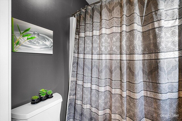 25700 Pastoral Dr, Plainfield, IL 60585 - full bath featuring toilet and a shower with shower curtain