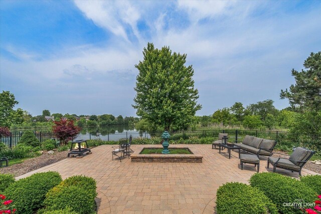 25700 Pastoral Dr, Plainfield, IL 60585 - view of patio with outdoor lounge area and a water view
