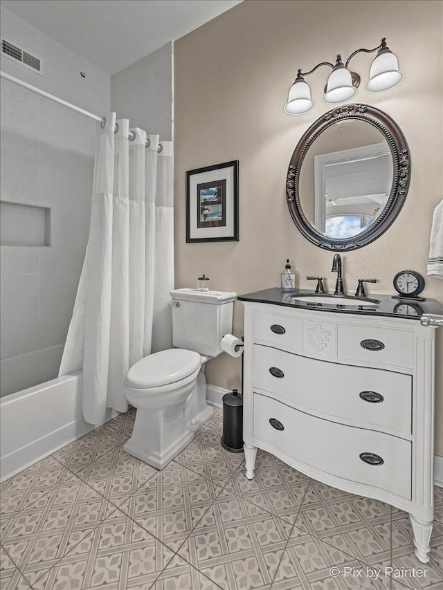 100 N River Ln Unit 409, Geneva, IL 60134 - full bathroom with vanity, toilet, shower / bath combo with shower curtain, and baseboards