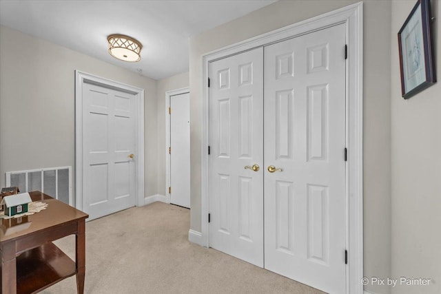 100 N River Ln Unit 409, Geneva, IL 60134 - corridor with light carpet and baseboards