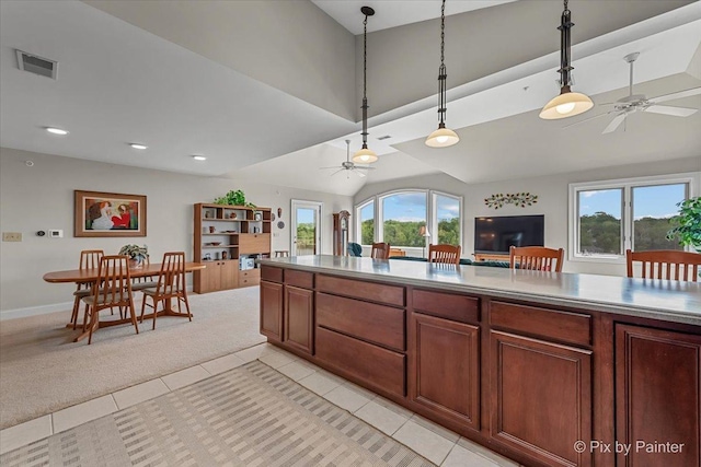 100 N River Ln Unit 409, Geneva, IL 60134 - kitchen featuring ceiling fan, pendant lighting, open floor plan, light tile patterned floors, and recessed lighting