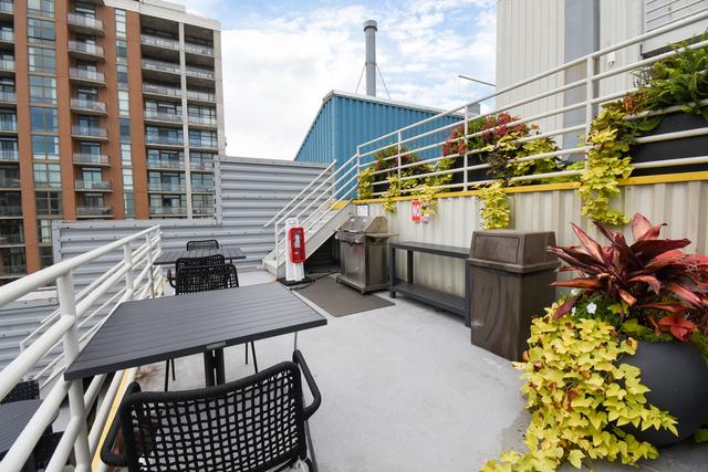 40 E 9th St Unit 716, Chicago, IL 60605 - view of patio / terrace featuring area for grilling, outdoor dining space, and a balcony