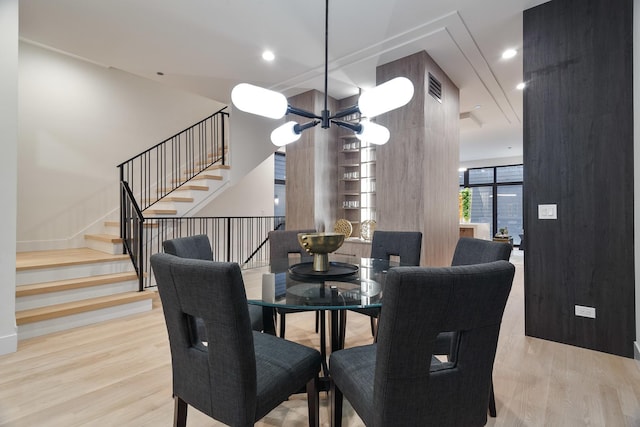 2049 W Race Ave, Chicago, IL 60612 - dining area featuring a chandelier, stairs, wood finished floors, and recessed lighting