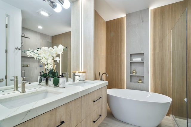 2049 W Race Ave, Chicago, IL 60612 - full bathroom featuring tile walls, a soaking tub, double vanity, and a tile shower
